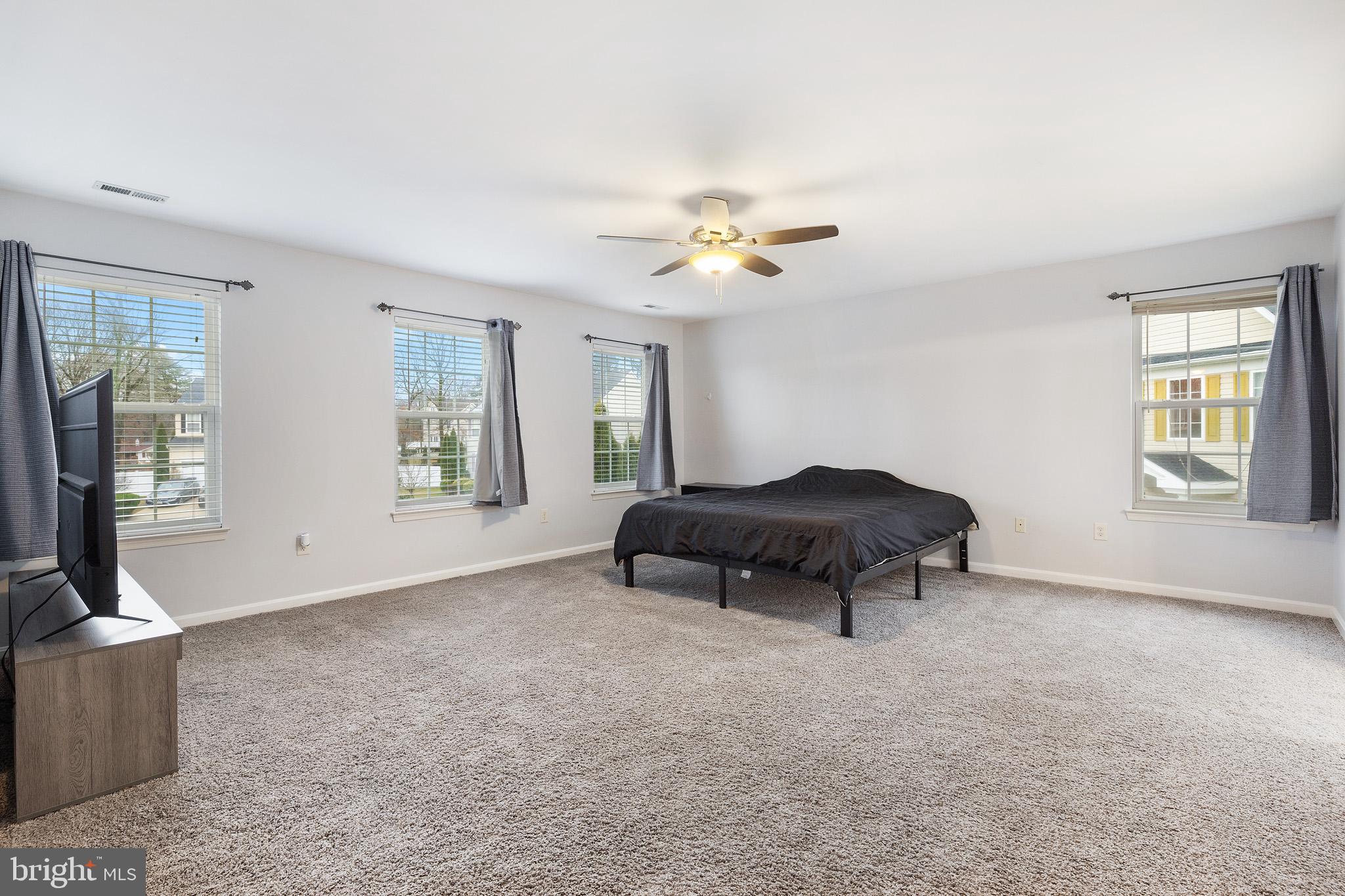8008 Carlean Court Pasadena, MD 21122 - Photo 15 of 35 a living room with furniture and a window