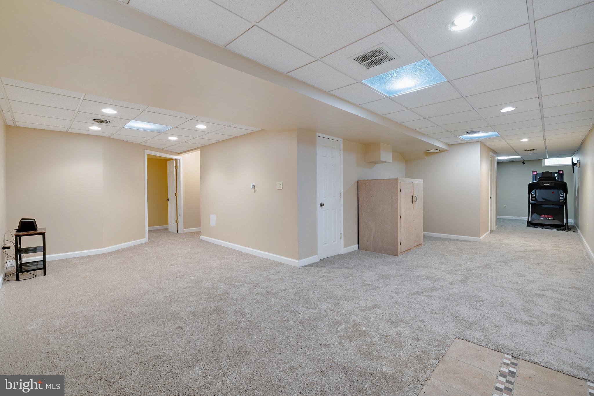 8008 Carlean Court Pasadena, MD 21122 - Photo 27 of 35 a view of a livingroom and a kitchen
