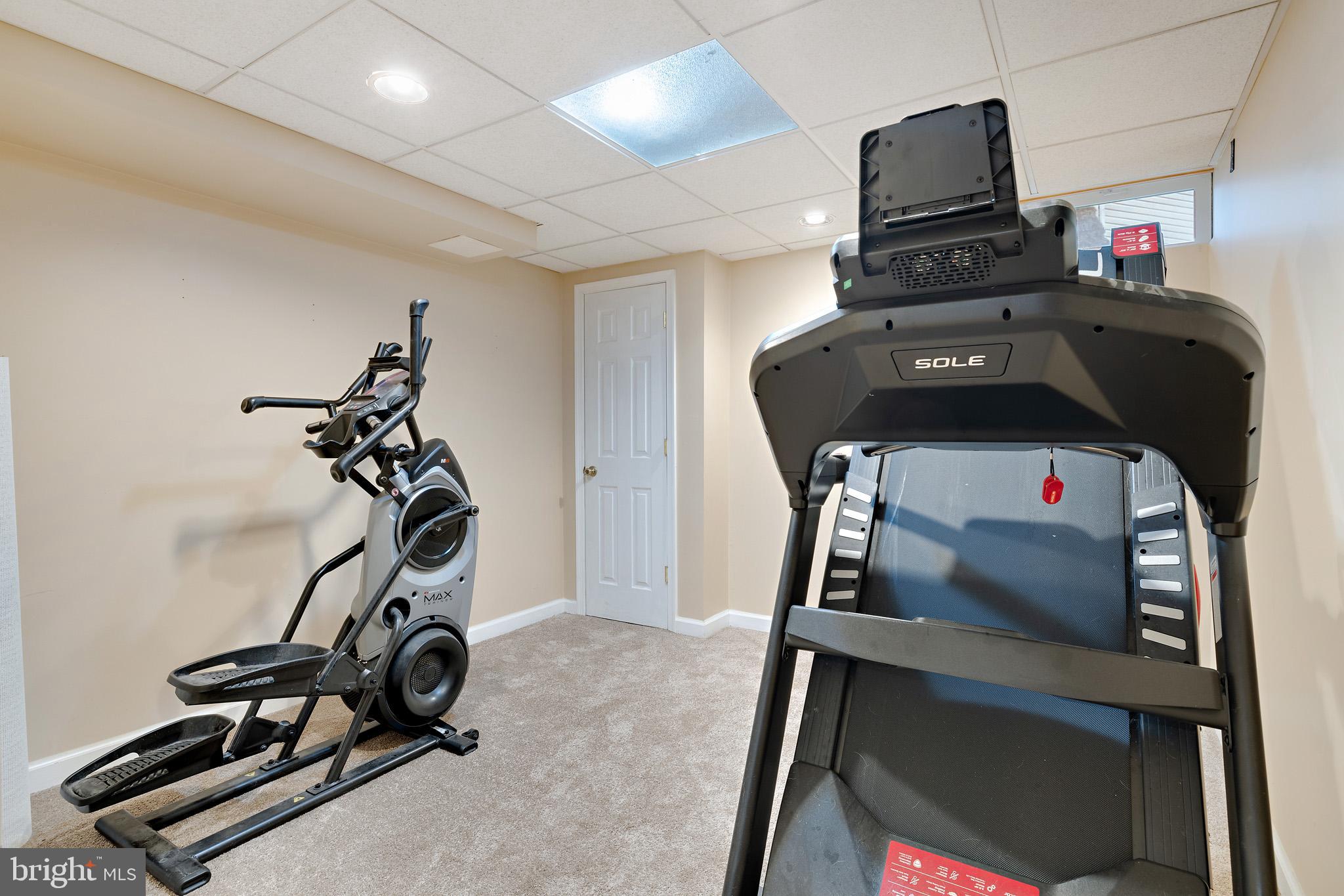 8008 Carlean Court Pasadena, MD 21122 - Photo 29 of 35 a view of a room with gym equipment
