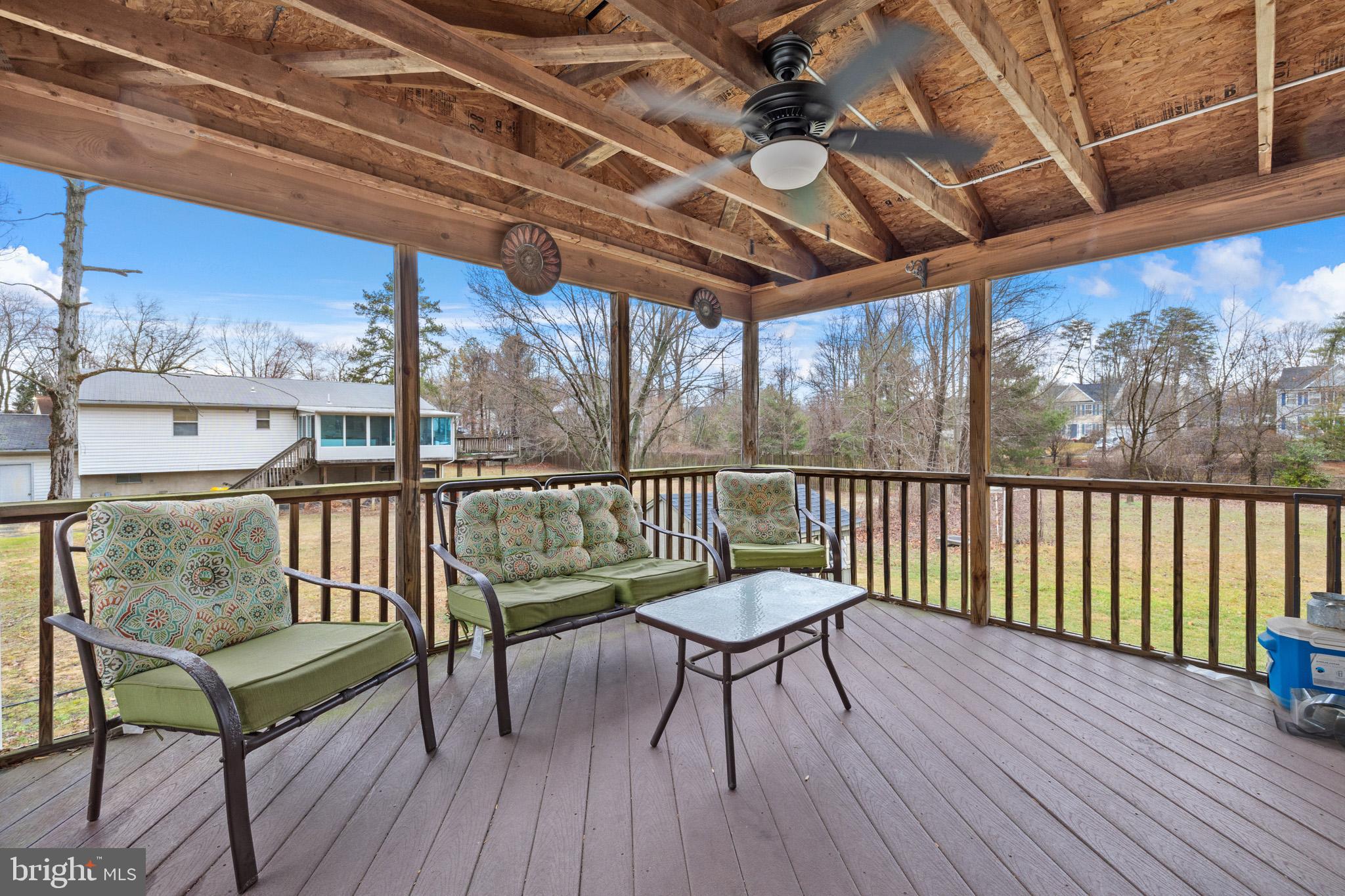 8008 Carlean Court Pasadena, MD 21122 - Photo 31 of 35 a view of a chairs on wooden deck