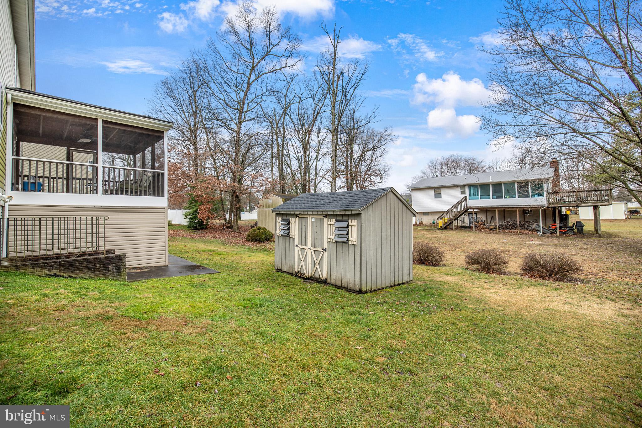 8008 Carlean Court Pasadena, MD 21122 - Photo 34 of 35 a view of a house with a yard