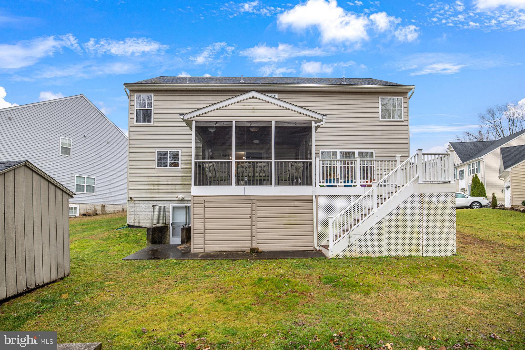 8008 Carlean Court Pasadena, MD 21122 - Photo 35 of 35 a view of a house with a yard