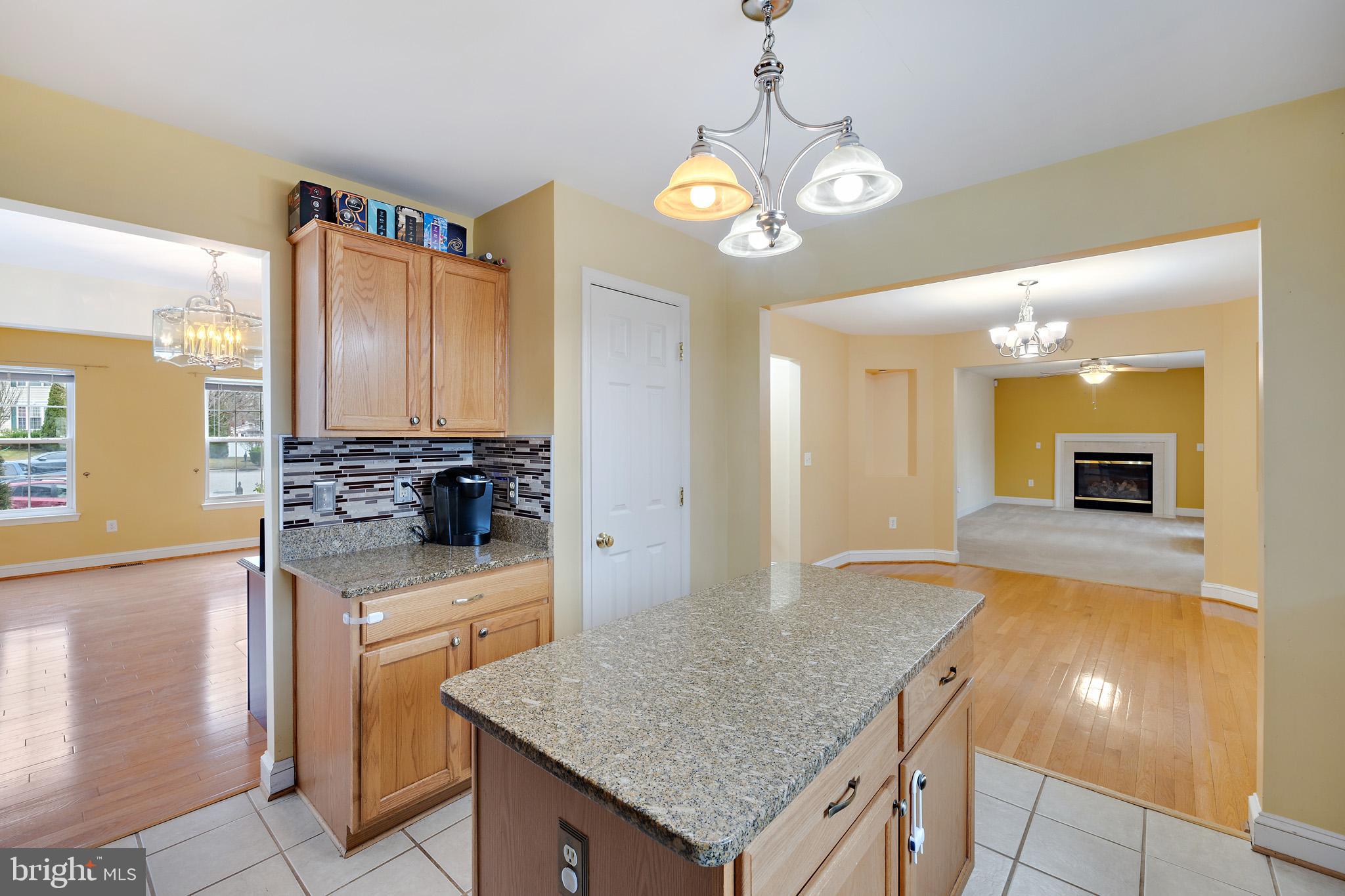8008 Carlean Court Pasadena, MD 21122 - Photo 6 of 35 a kitchen with a counter space cabinets and appliances