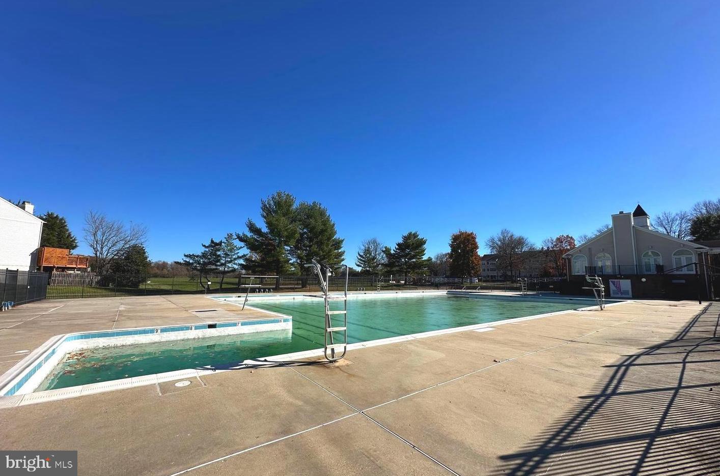 14200 Valleyfield Drive, Unit 437 Silver Spring, MD 20906 - Photo 17 of 17 a view of a lake and a yard