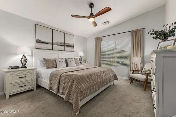 a bathroom with a mirror and a sink