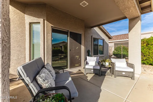 a view of a lake with houses in front of it