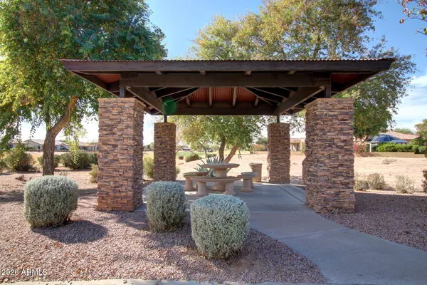 a view of a swimming pool with a yard
