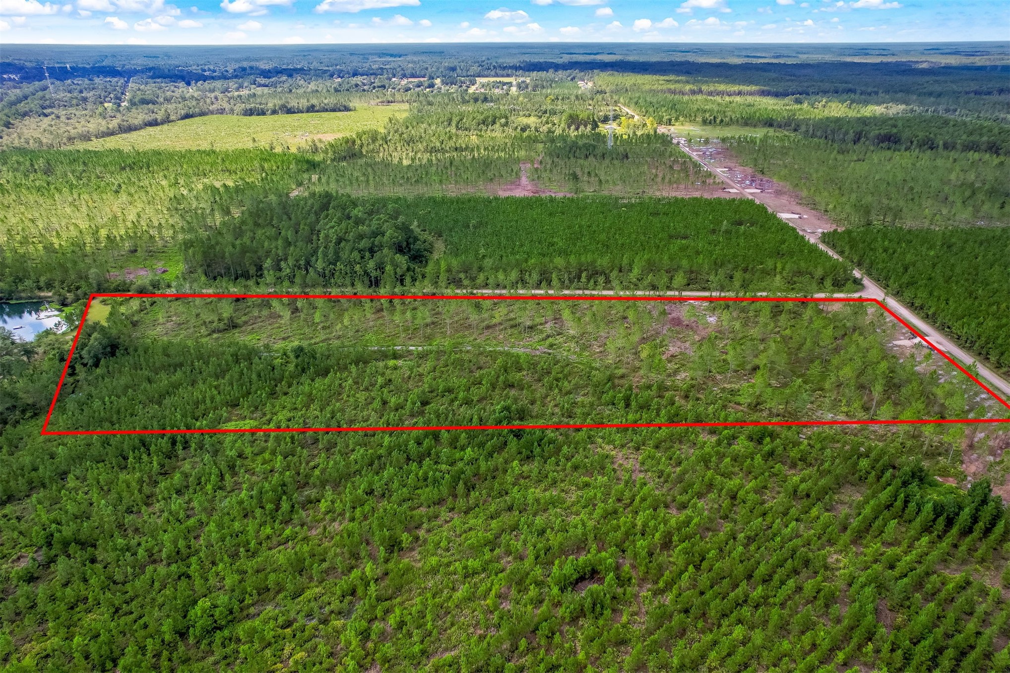 Lot 9 Georgia Street Hilliard, FL 32046 - Photo 3 of 14 a view of a garden with a small yard