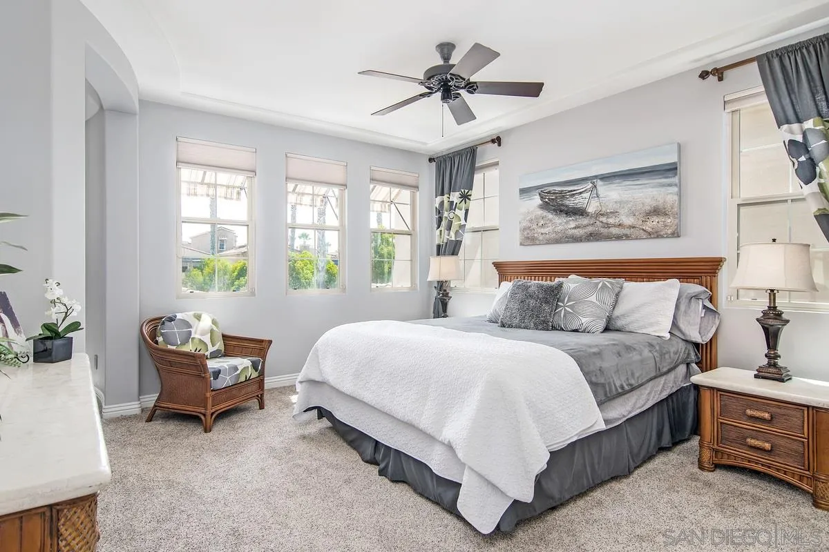 2080 Historic Decatur Road San Diego, CA 92106 - Photo 20 of 47 a spacious bedroom with a bed and a window