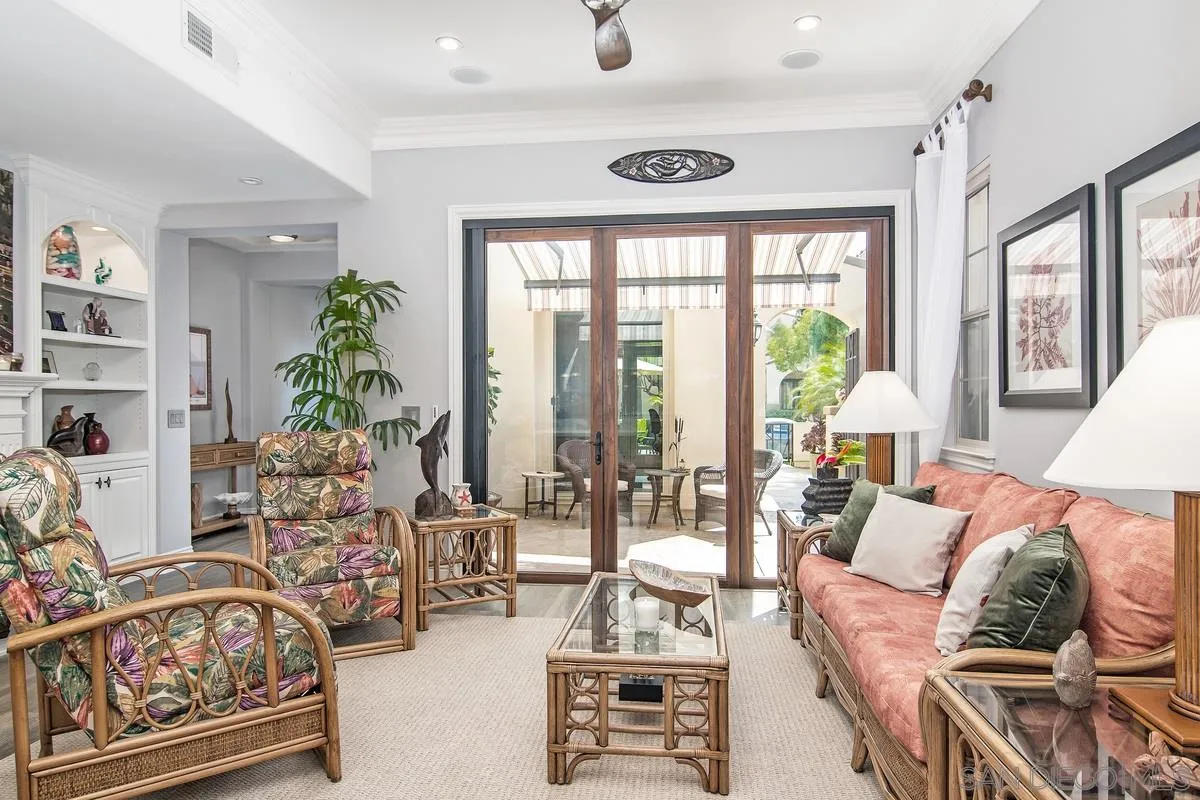 2080 Historic Decatur Road San Diego, CA 92106 - Photo 8 of 47 a living room with furniture and floor to ceiling windows
