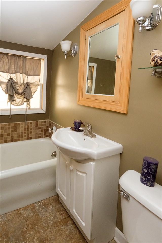 515 South Alpine Road Rockford, IL 61108 - Photo 18 of 25 a bathroom with a sink and a mirror