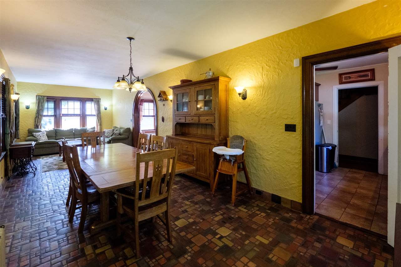 515 South Alpine Road Rockford, IL 61108 - Photo 3 of 25 a view of a dining room with furniture window and wooden floor