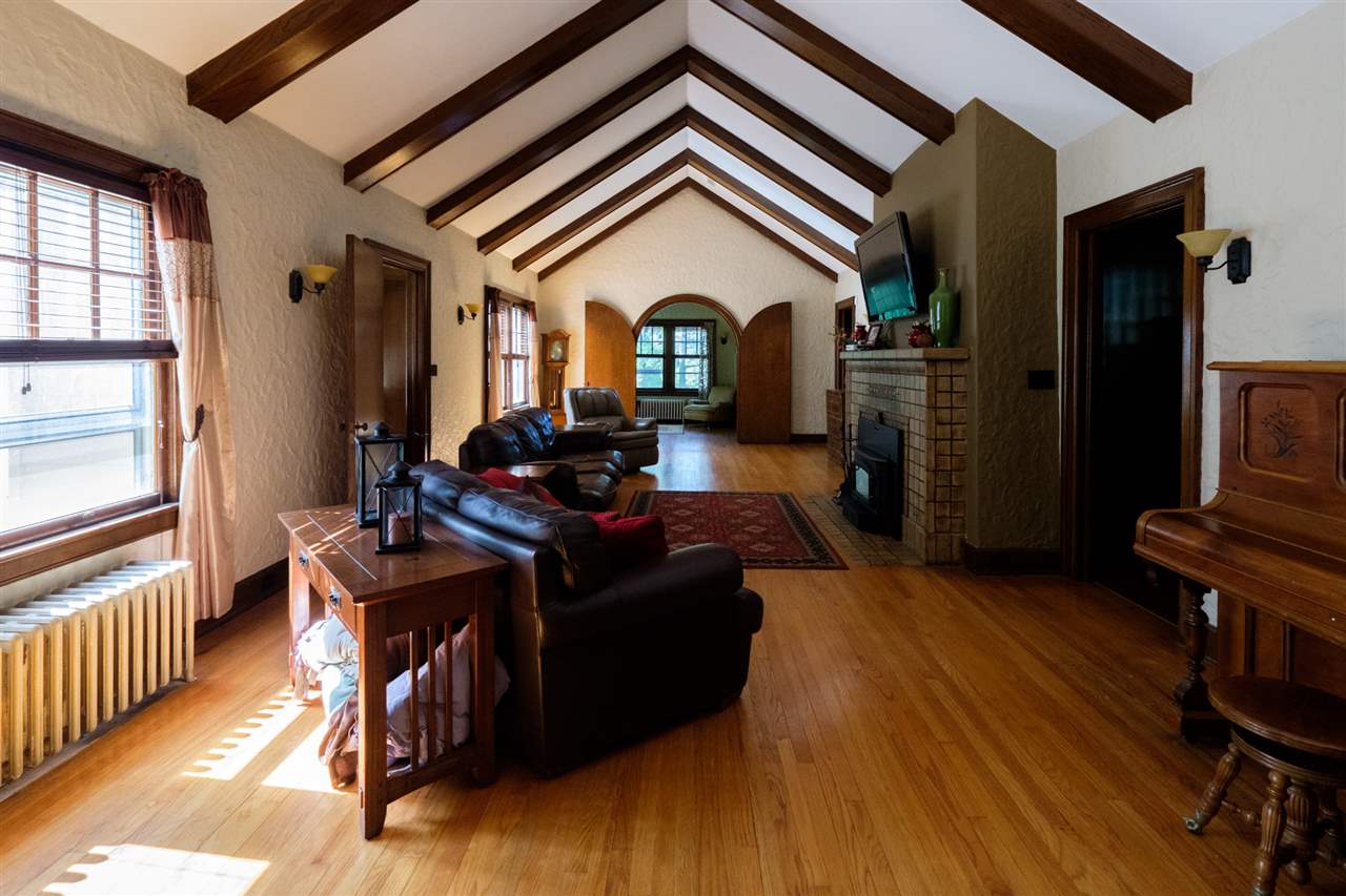 515 South Alpine Road Rockford, IL 61108 - Photo 4 of 25 a living room with furniture and a fireplace