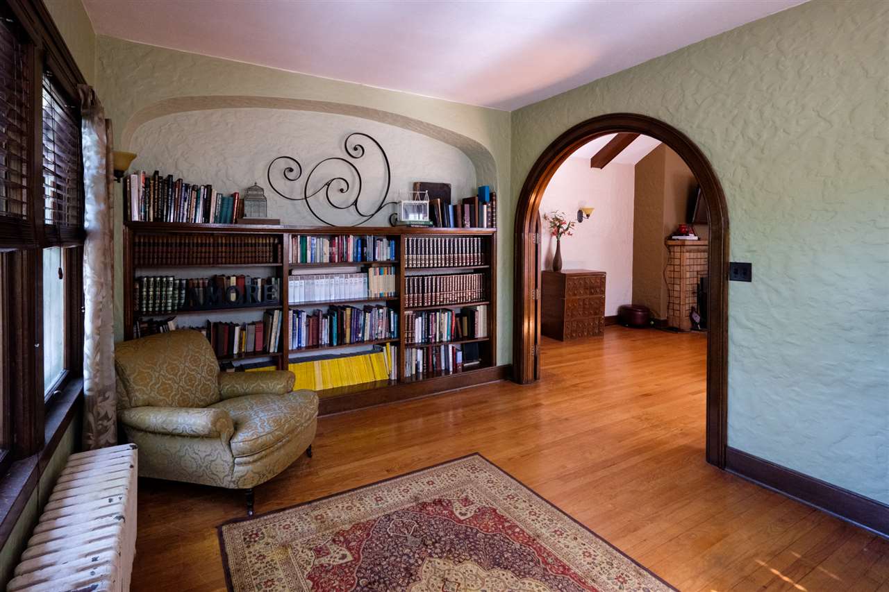515 South Alpine Road Rockford, IL 61108 - Photo 7 of 25 a living room with furniture and a rug