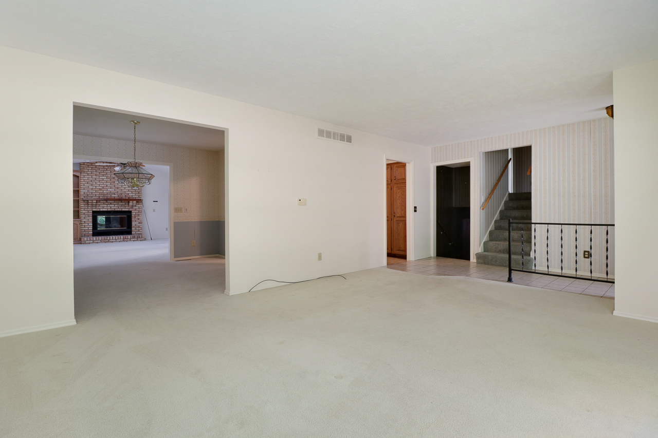 126 South Orr Drive Normal, IL 61761 - Photo 12 of 46 a view of an empty room with a fireplace