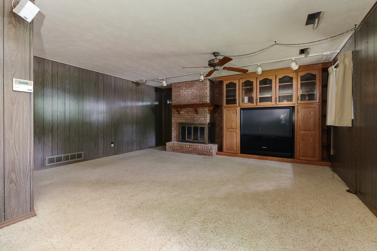 126 South Orr Drive Normal, IL 61761 - Photo 32 of 46 a view of an empty room with a fireplace