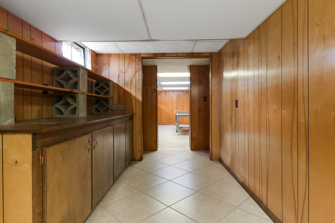 126 South Orr Drive Normal, IL 61761 - Photo 40 of 46 a view of a hallway with wooden shelves