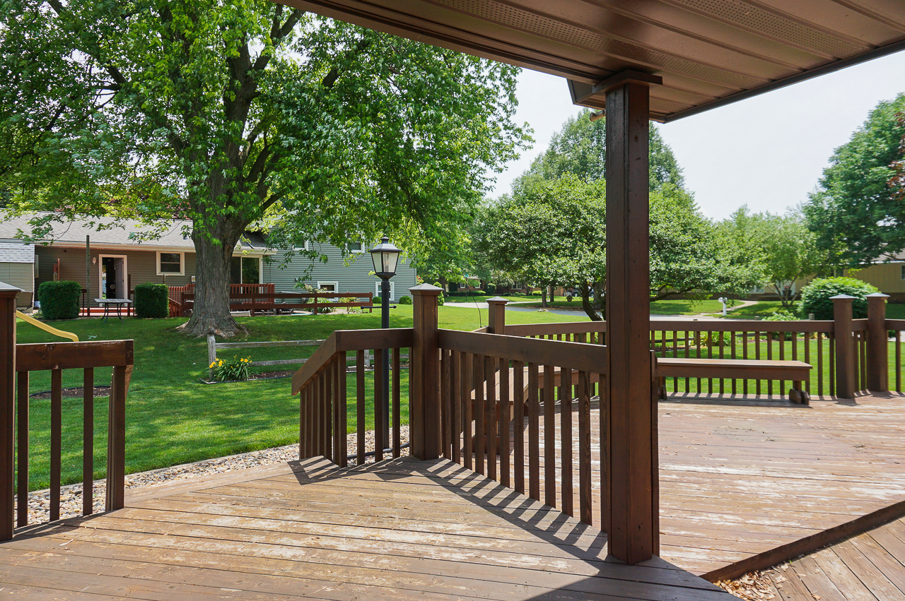 126 South Orr Drive Normal, IL 61761 - Photo 44 of 46 a front view of a house with a big yard and potted plants