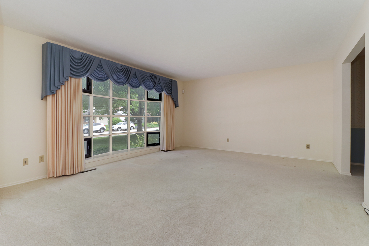 126 South Orr Drive Normal, IL 61761 - Photo 10 of 46 a view of a room with wooden floor and window