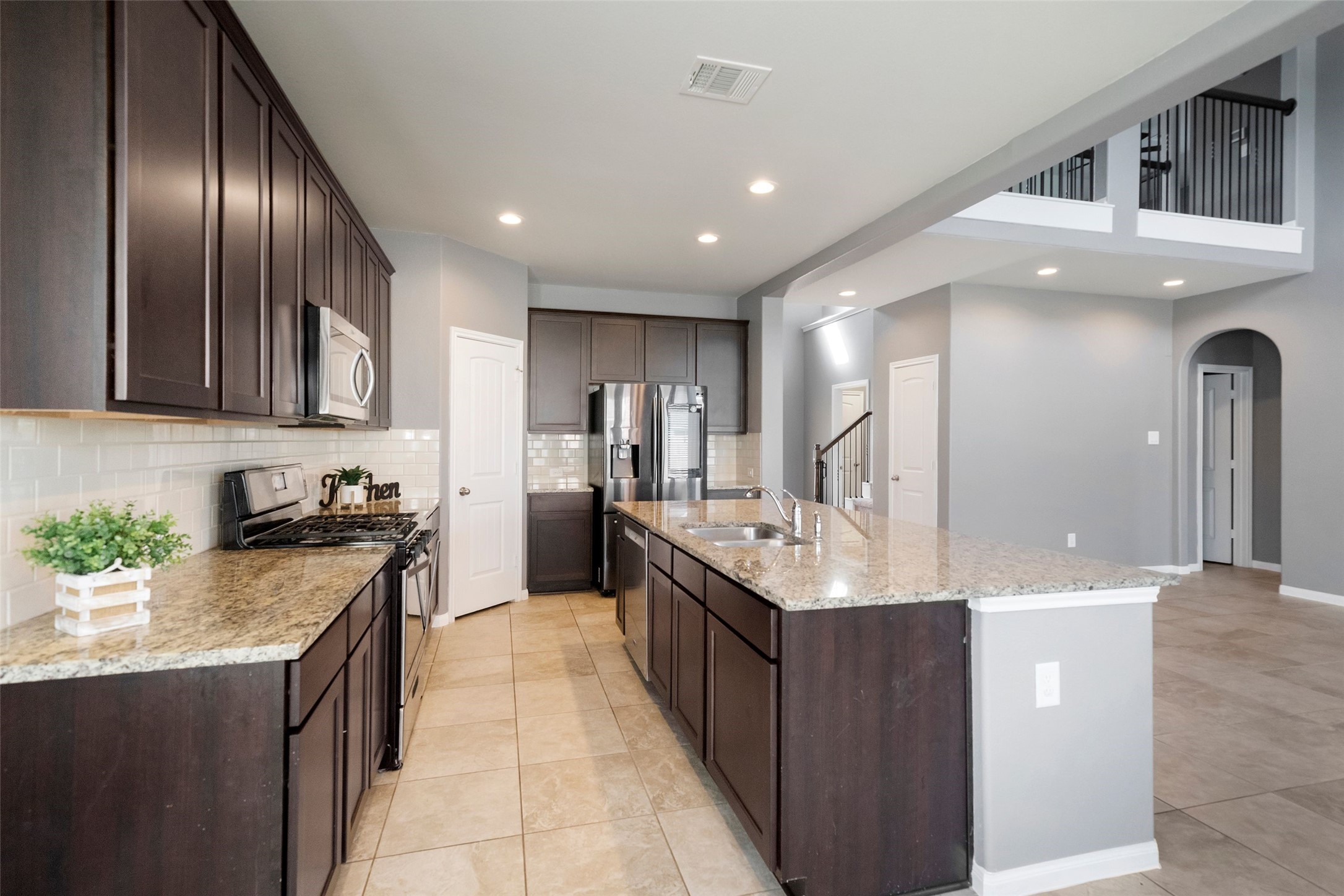 21674 Tea Tree Olive Place Porter, TX 77365 - Photo 11 of 24 Large kitchen with a ss refrigerator!