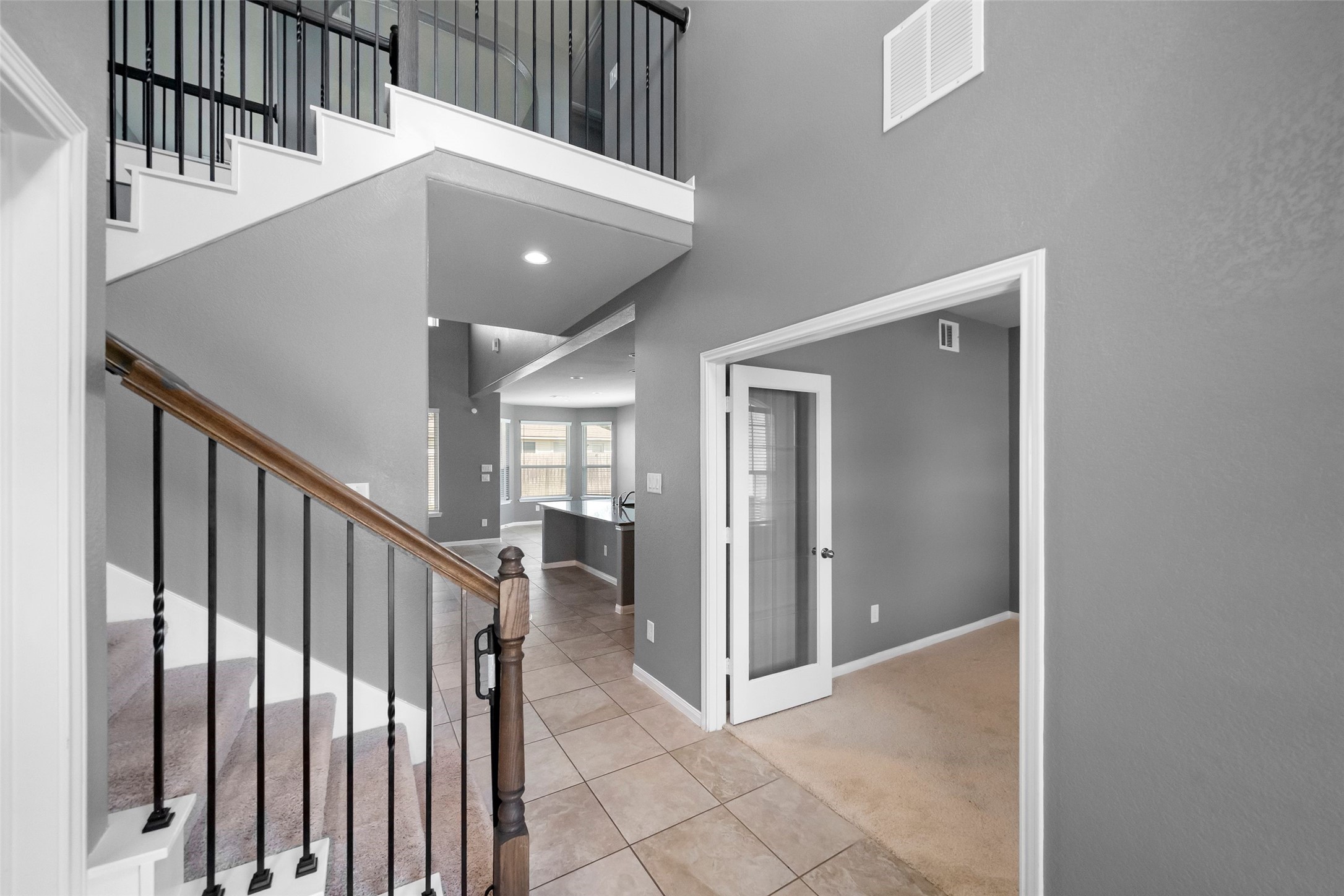 21674 Tea Tree Olive Place Porter, TX 77365 - Photo 4 of 24 Beautiful staircase and a large office to the right!