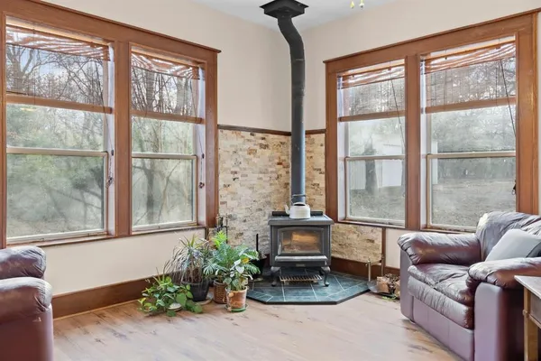 a living room with furniture and a window