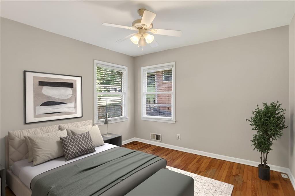3086 Caldwell Road Northeast Atlanta, GA 30341 - Photo 8 of 11 a bedroom with a bed and a window