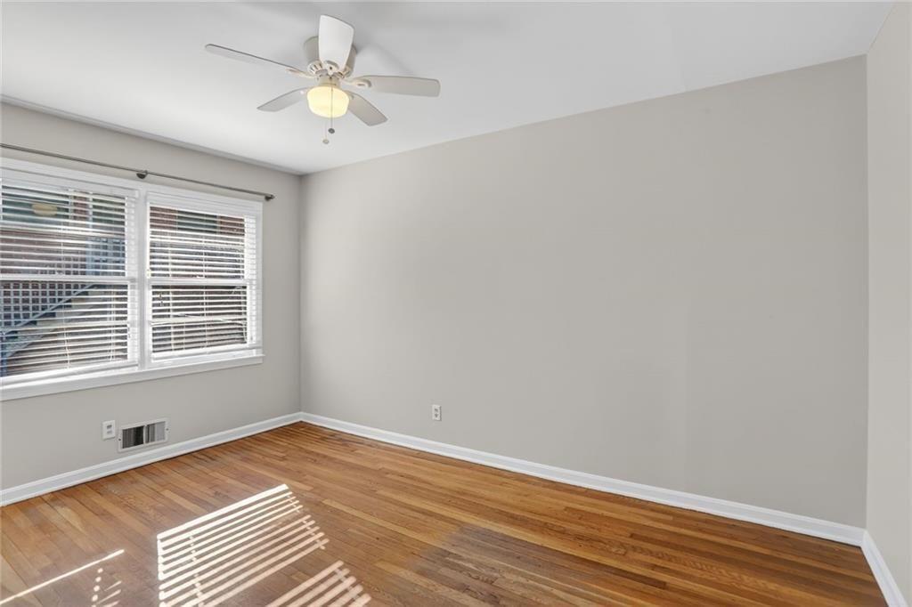 3086 Caldwell Road Northeast Atlanta, GA 30341 - Photo 10 of 11 a view of a room with wooden floor and a window