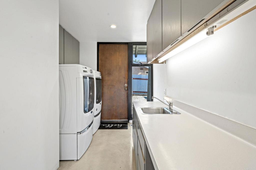 754 El Rancho Drive El Cajon, CA 92019 - Photo 33 of 55 a bathroom with a sink and a mirror