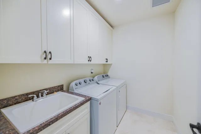 a view of living room with furniture and a window