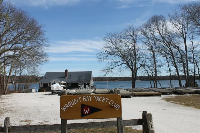 a view of house with outdoor space and sitting area