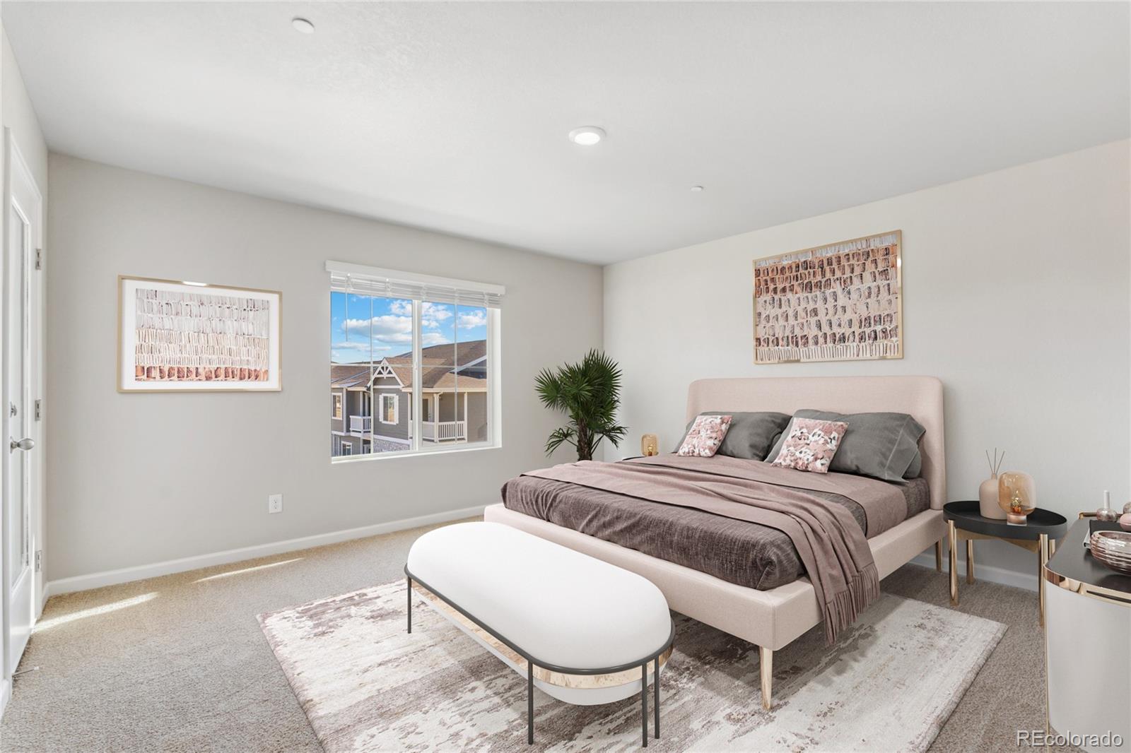 163 Robin Road Johnstown, CO 80534 - Photo 6 of 24 a bedroom with a bed and a chair