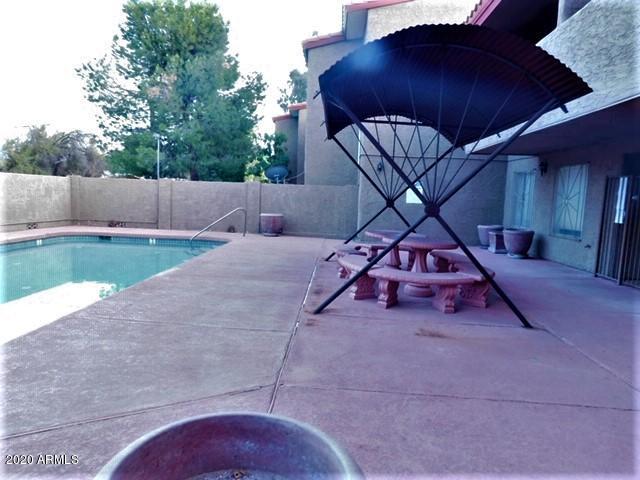 151 East Broadway Road, Unit 207 Tempe, AZ 85282 - Photo 11 of 16 Pool sitting area