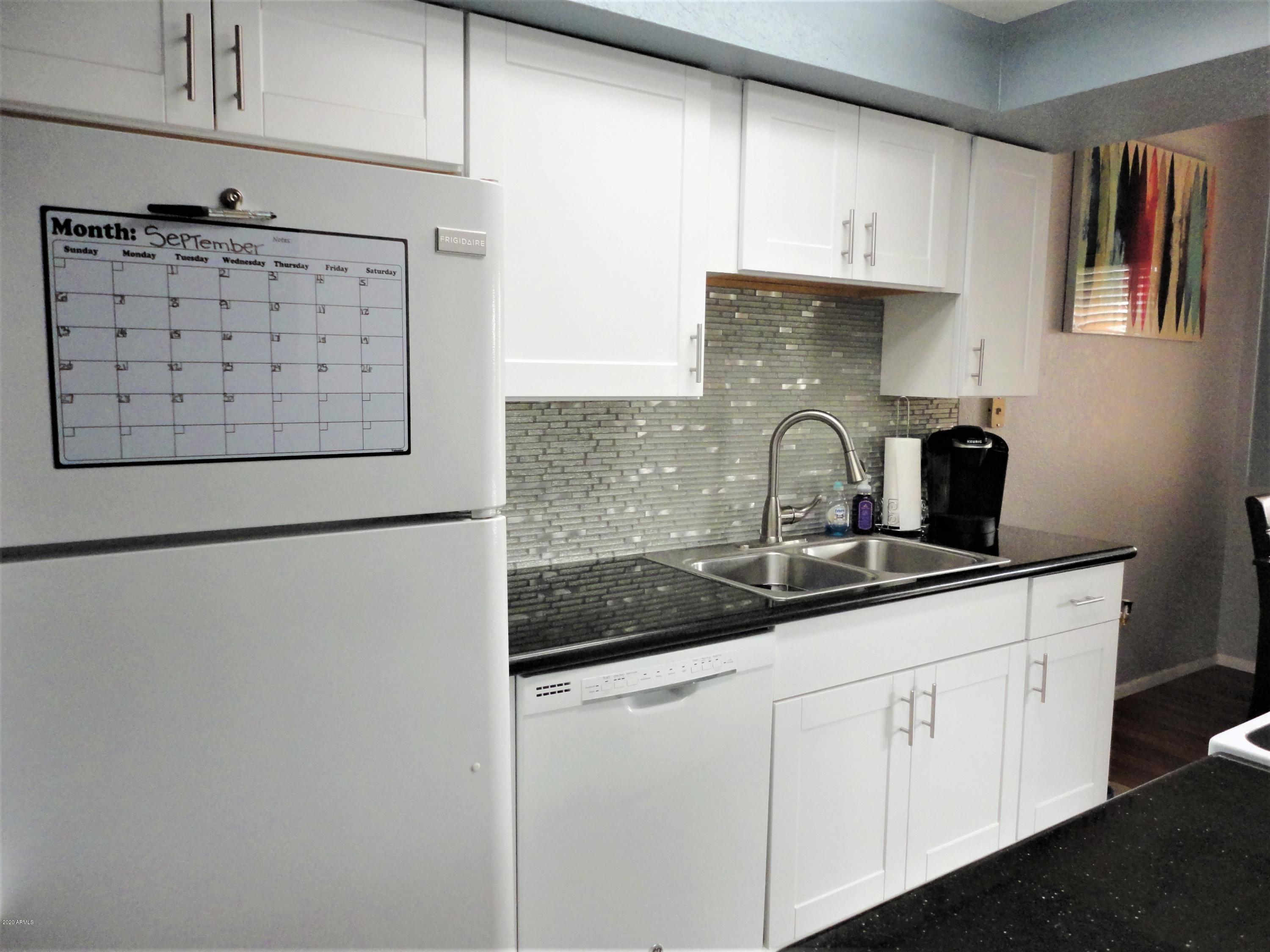 151 East Broadway Road, Unit 207 Tempe, AZ 85282 - Photo 4 of 16 Kitchen with upgraded faucet