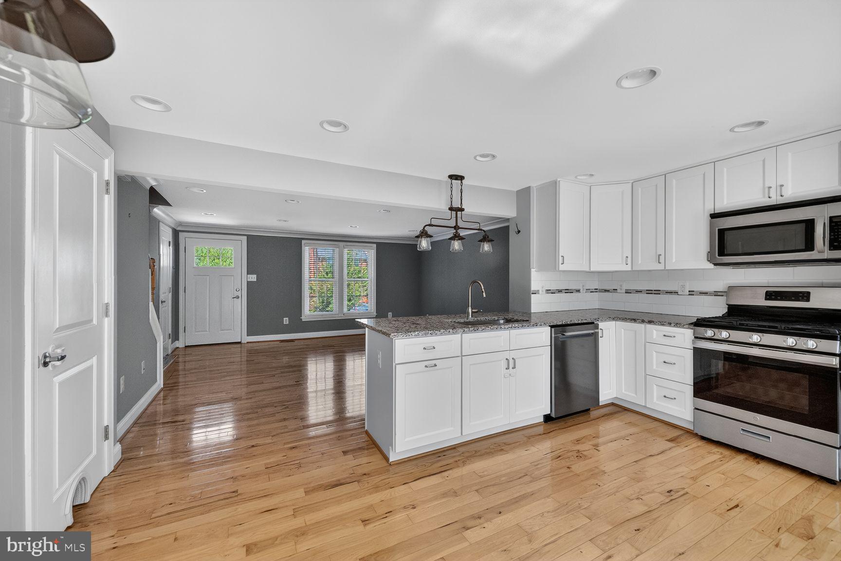 43983 Choptank Terrace Ashburn, VA 20147 - Photo 8 of 21 Modern kitchen with open layout charm.