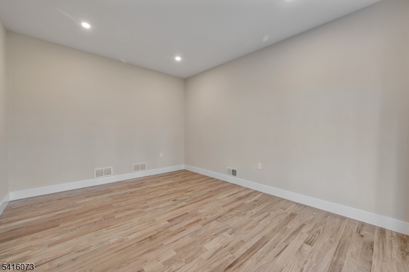 139 Flanders Netcong Road Flanders, NJ 07836 - Photo 12 of 40 a view of room with wooden floor and fan