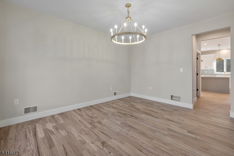 139 Flanders Netcong Road Flanders, NJ 07836 - Photo 23 of 40 a view of empty room with wooden floor