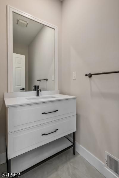 139 Flanders Netcong Road Flanders, NJ 07836 - Photo 25 of 40 a bathroom with a sink and a mirror