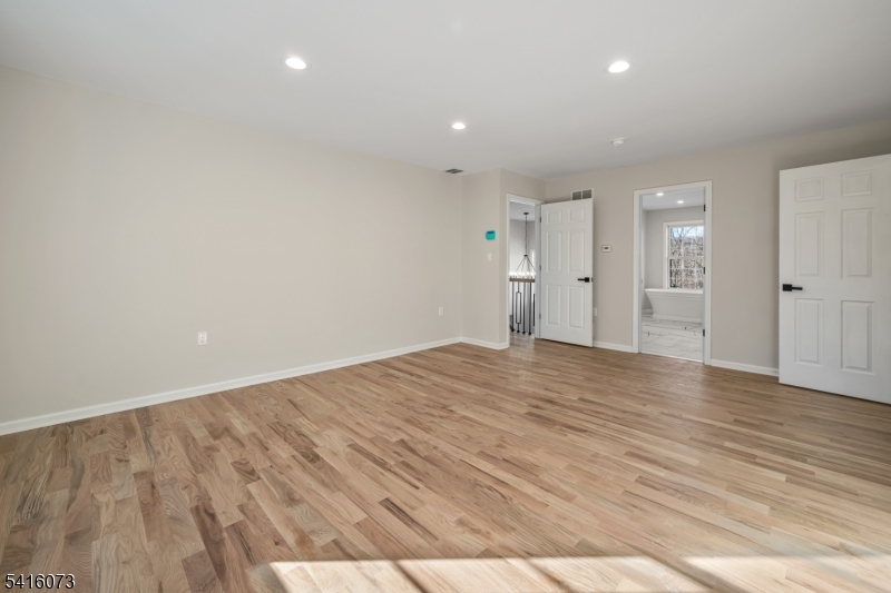 139 Flanders Netcong Road Flanders, NJ 07836 - Photo 27 of 40 a view of empty room with wooden floor