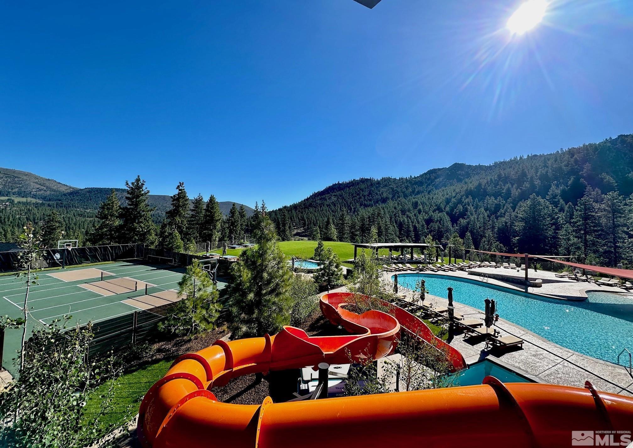 3237 Smt Cp Way, Unit C31 Carson City, NV 89705 - Photo 13 of 22 a view of a swimming pool with a patio