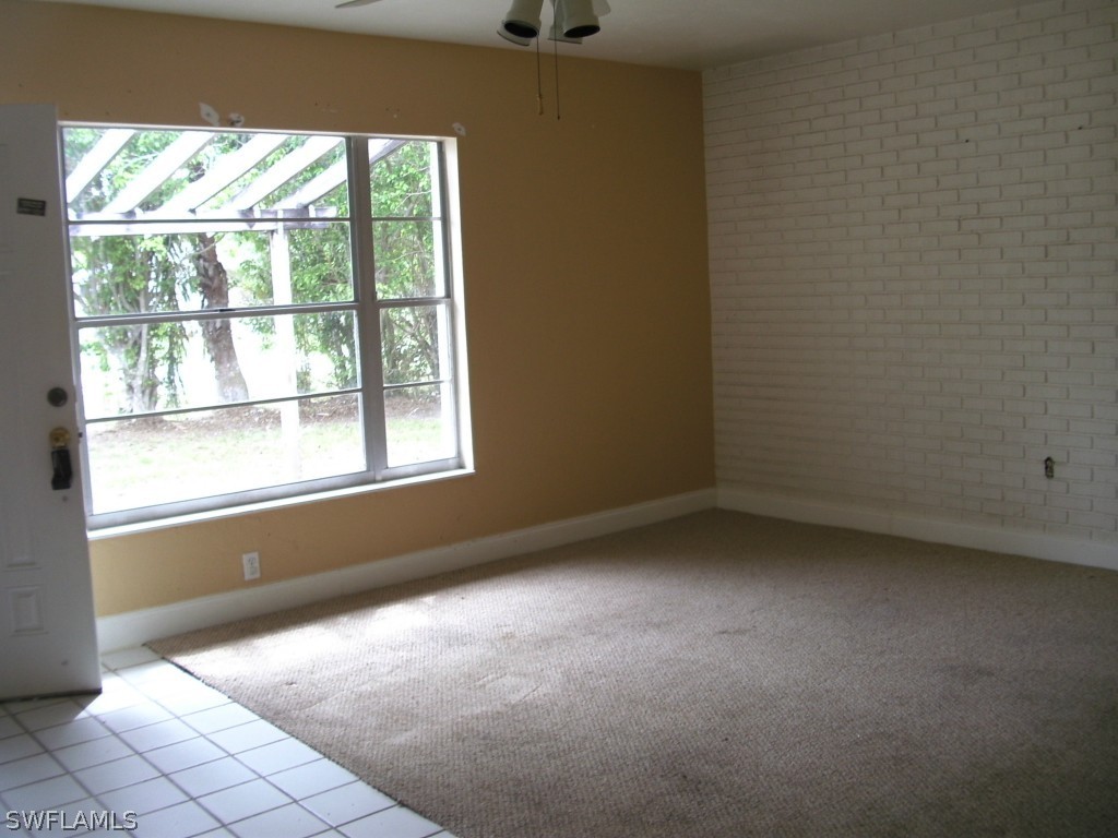 18595 Geranium Road Fort Myers, FL 33967 - Photo 4 of 15 a view of a room that has a window in it