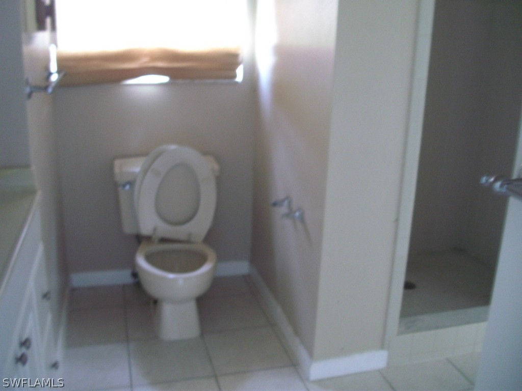 18595 Geranium Road Fort Myers, FL 33967 - Photo 8 of 15 a bathroom with a toilet
