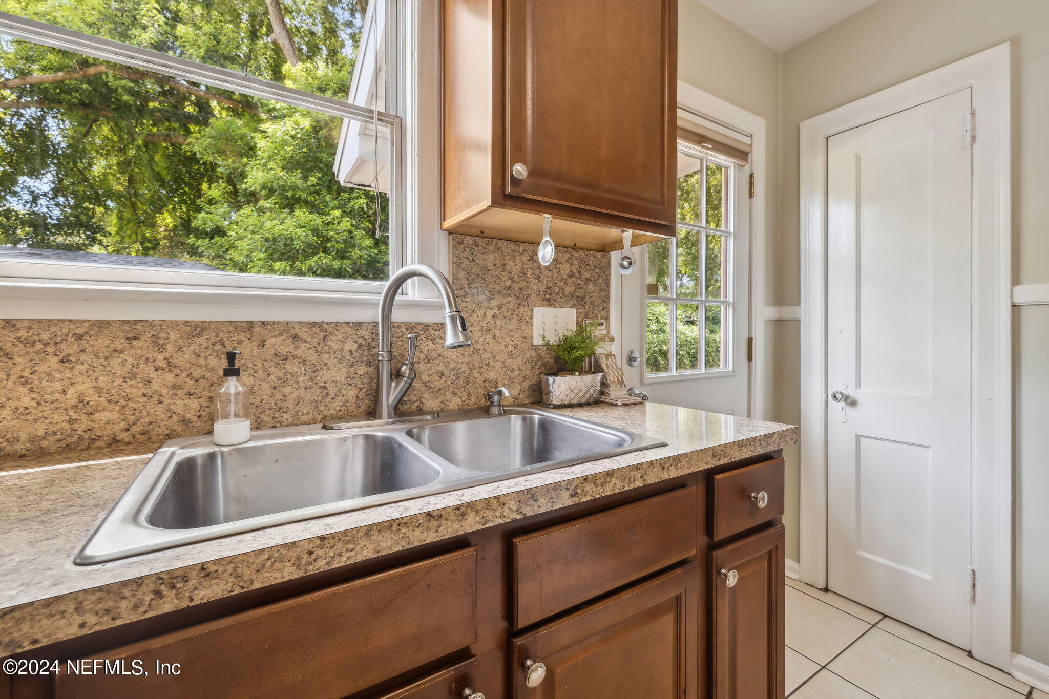 4720 Sunderland Road Jacksonville, FL 32210 - Photo 20 of 36 Kitchen leading to side door