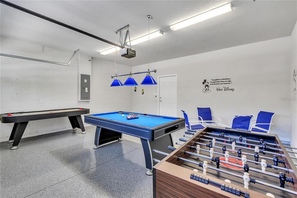 8916 Rhodes Street Kissimmee, FL 34747 - Photo 27 of 34 a room with furniture and pool table
