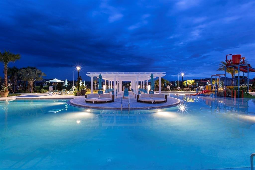 8916 Rhodes Street Kissimmee, FL 34747 - Photo 31 of 34 a living room with furniture and a large window