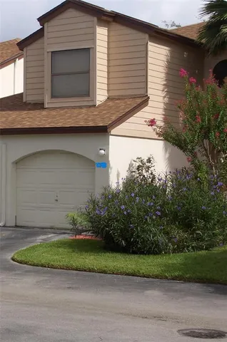 a house that has a lot of plants in it