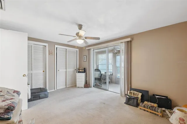 a view of a livingroom with furniture and empty room