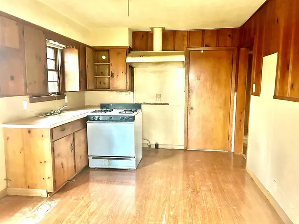 a view of a kitchen with a sink