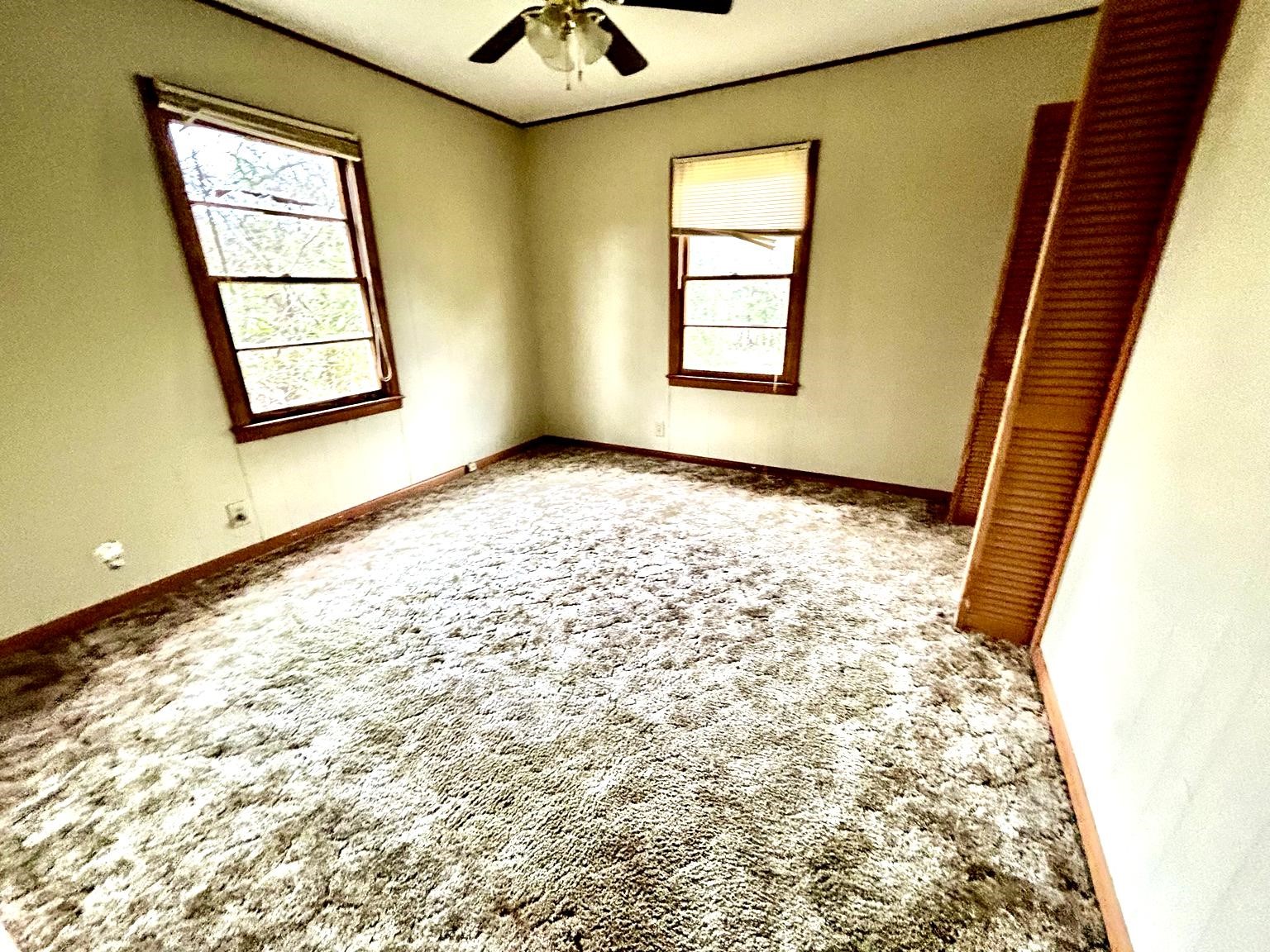 9122 Tulane Road Orange, TX 77630 - Photo 7 of 17 a view of an empty room and window