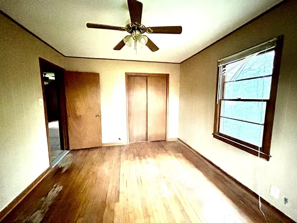 a view of an empty room and window